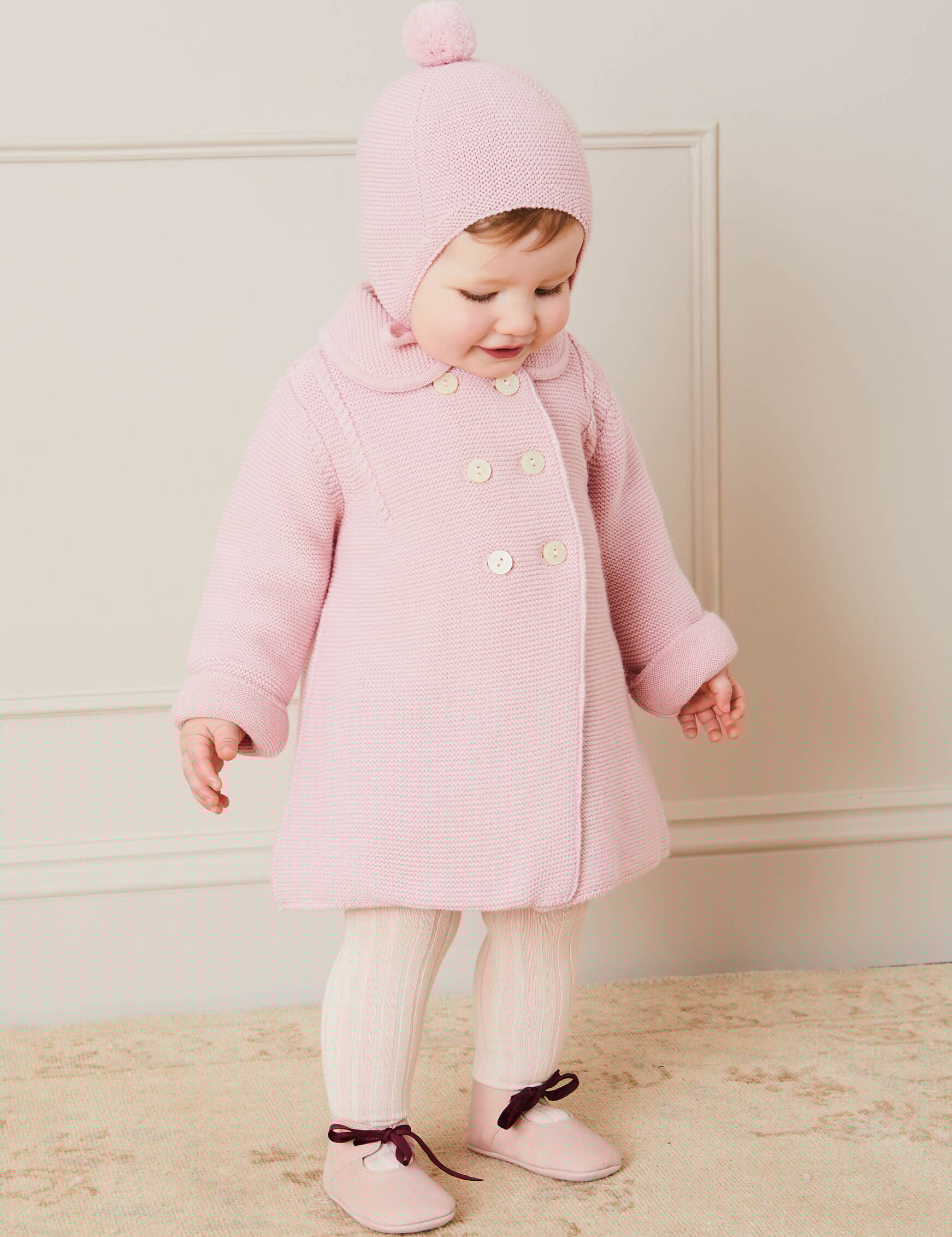 Merino Wool Pom Pom Hat In Pink (S-L) KNITTED ACCESSORIES from Pepa London