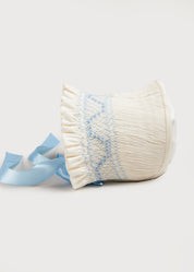 Off White and Blue Hand Smocked Baby Bonnet Knitted Accessories  from Pepa London