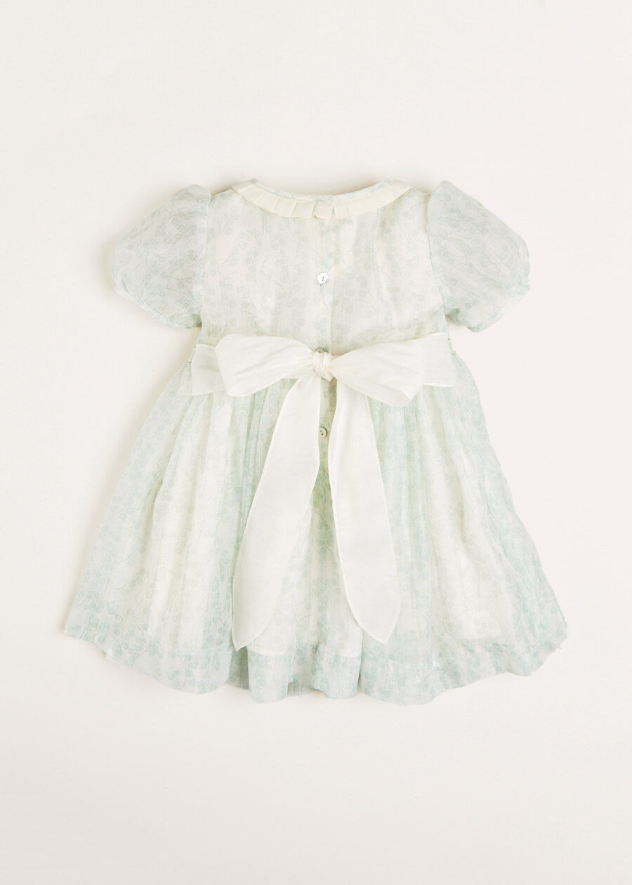 Constance Floral Print Hand Smocked Short Sleeve Party Dress in Light Green (12m-10yrs) Dresses from Pepa London