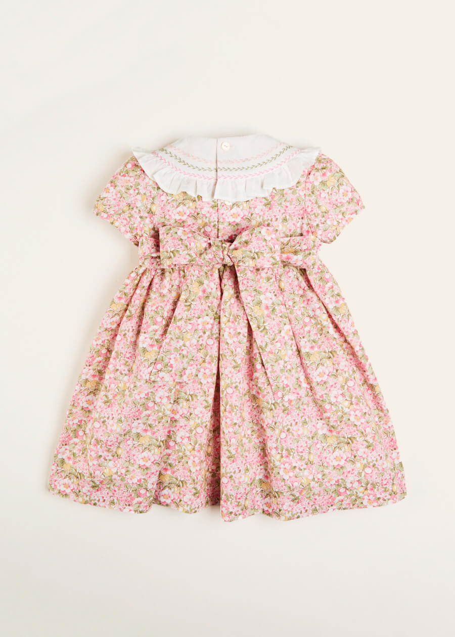 Eloise Floral Print Hand Smocked Short Sleeve Dress in Pink (12mths-10yrs) Dresses  from Pepa London