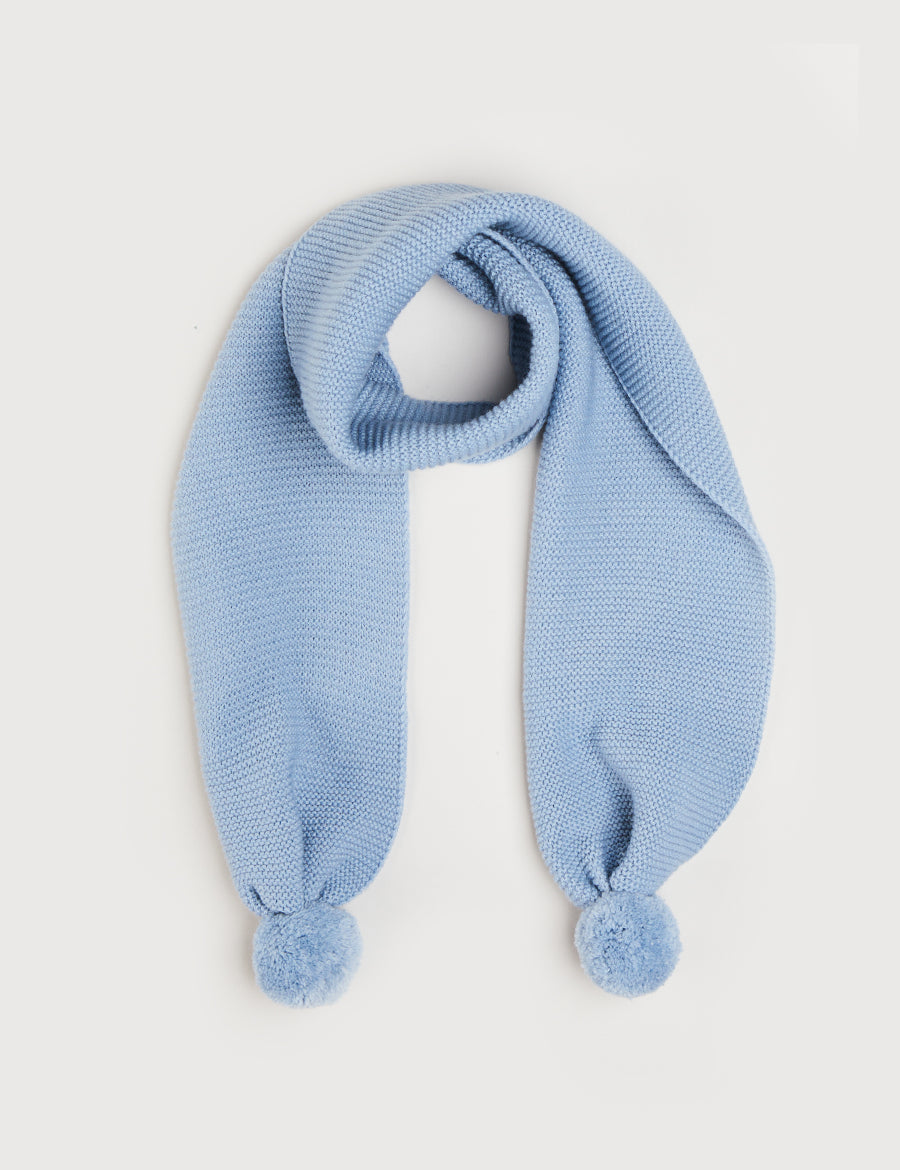 Merino Wool Pom Pom Scarf In Blue KNITTED ACCESSORIES  from Pepa London