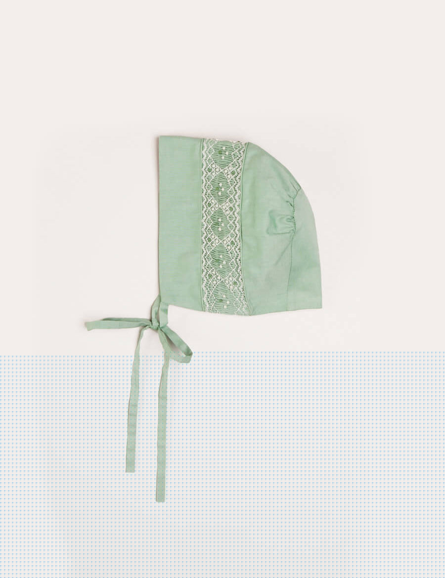 Plain Hand Smocked Bonnet in Green Knitted Accessories  from Pepa London