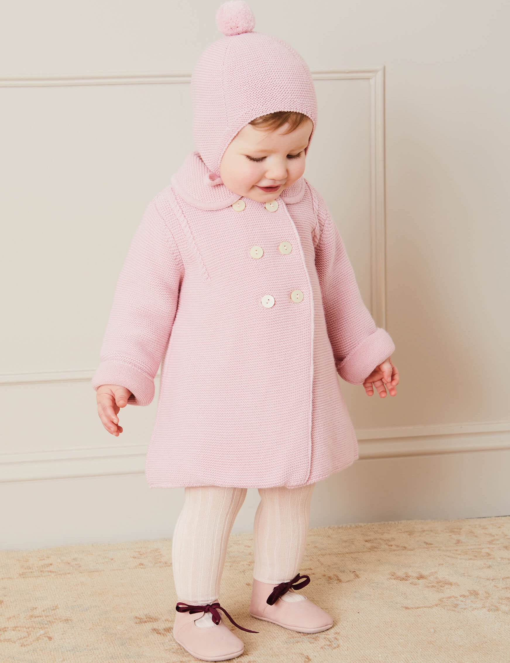 Merino Wool Pom Pom Hat In Pink (S-L) KNITTED ACCESSORIES  from Pepa London