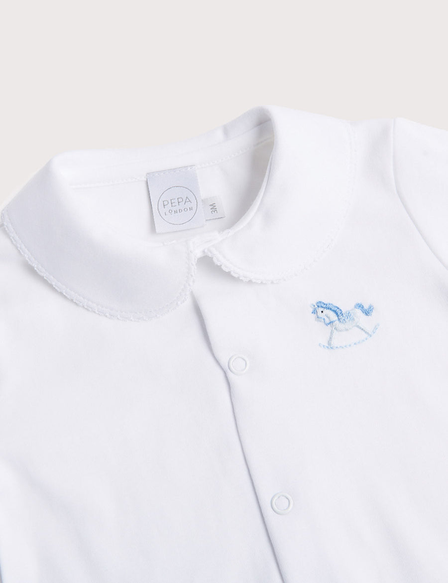 Newborn All-In-One With Rocking Horse Embroidery In Blue (1-6mths) Tops & Bodysuits  from Pepa London