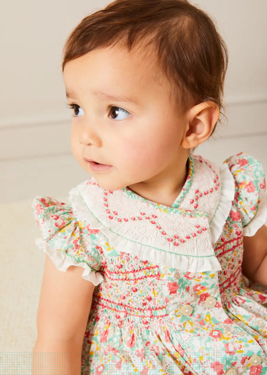 Clementine Floral Hand Smocked Double Breasted Short Sleeve Romper in Coral (6mths-3yrs) ROMPERS from Pepa London