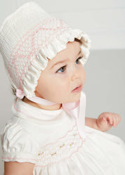 Off White and Pink Hand Smocked Baby Bonnet Knitted Accessories  from Pepa London
