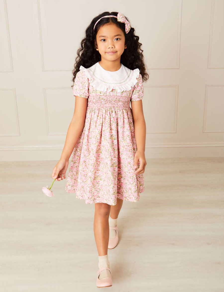 Eloise Floral Print Hand Smocked Short Sleeve Dress in Pink (12mths-10yrs) Dresses  from Pepa London