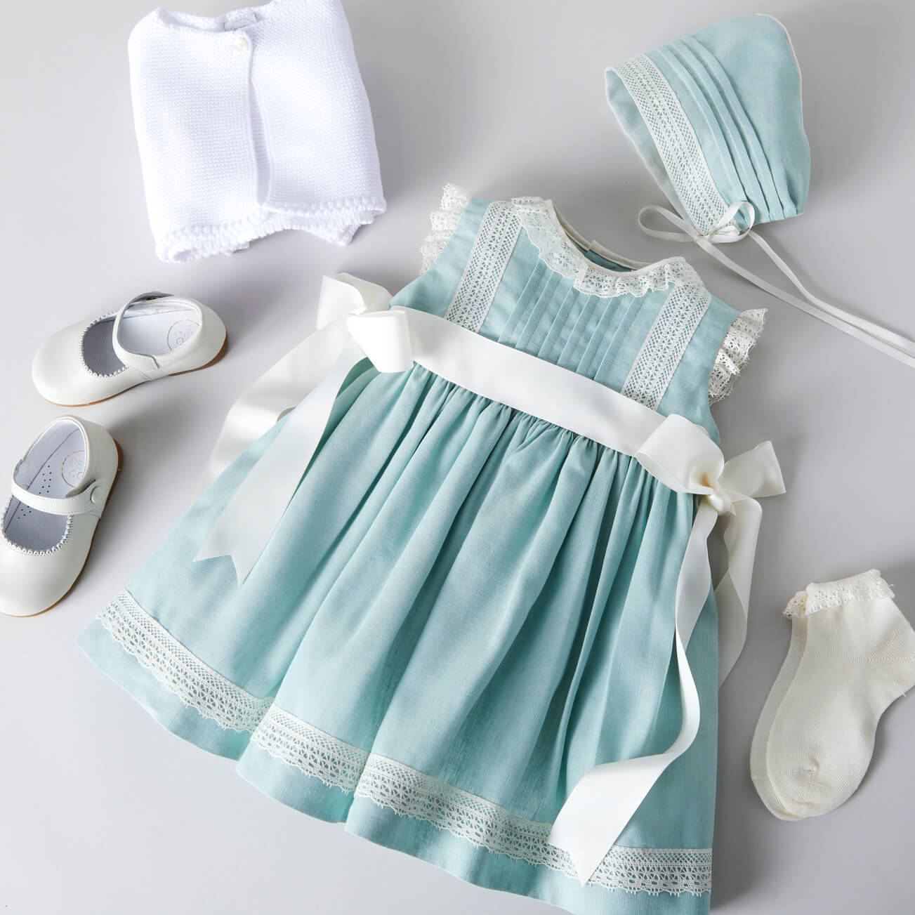 Lace Trim Ivory Bow Dress in Teal (6mths-5yrs) dresses  from Pepa London